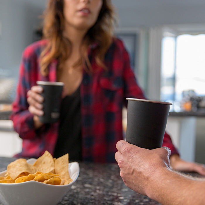16oz-pint-cup-u5 16ounce_steel_pint_cup_black_party_lifestyle_e7c4b89f-bee2-44df-bb63-bc286febb421.jpg