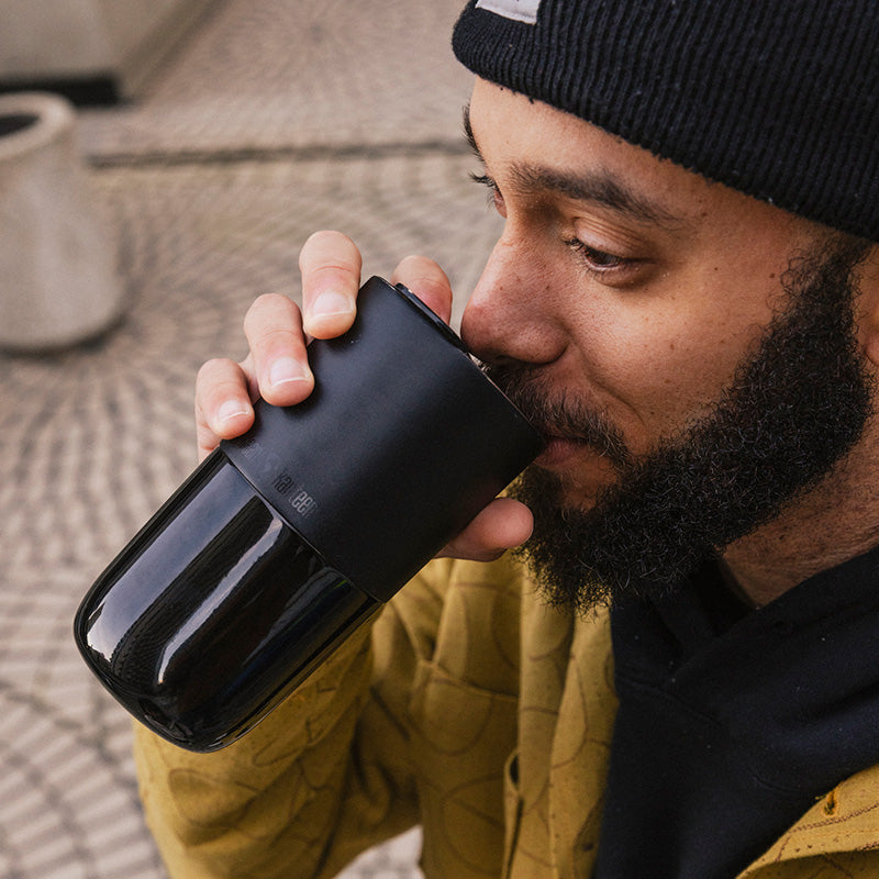 daily-on-the-go-set-c4 16oz_rise_tumbler_black_man_drink_square.jpg