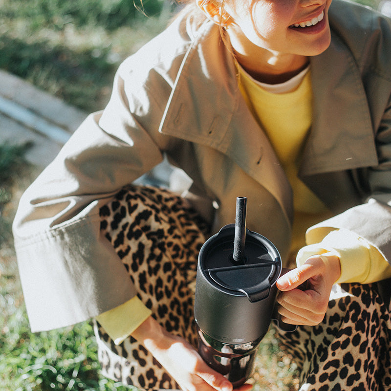26oz-rise-tumbler-with-straw-lid-y1 26oz_rise_tumbler_black_woman_topview_square.jpg