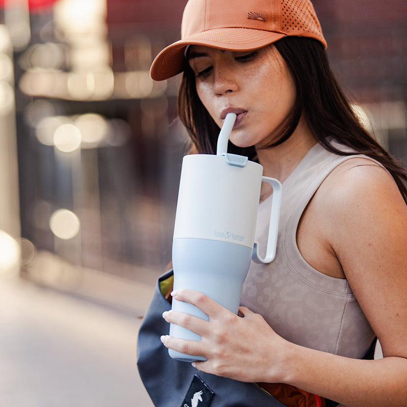 36oz-rise-tumbler-with-straw-lid-k1 36oz_rise_tumbler_straw_girl_sip_square.jpg