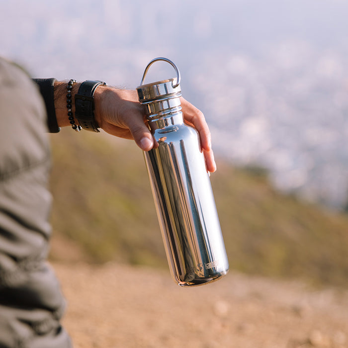 27oz-reflect-with-bamboo-cap-b6 K27SSLRF-MS-BAMBOO_reflect_bottle_hand_lifestyle.jpg