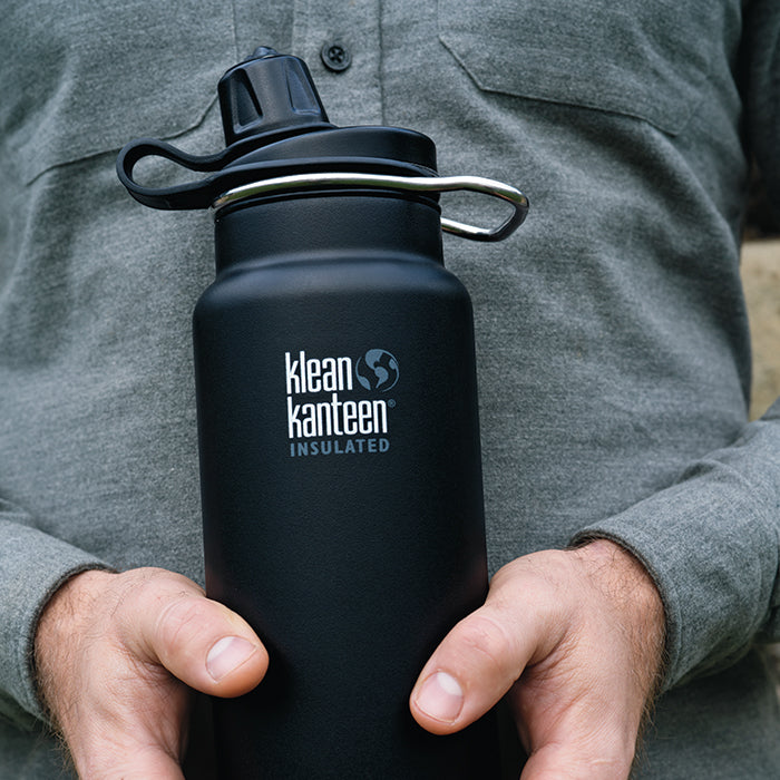 tkwide-chug-cap-o4 K32TKWSSL-SB-Craddled-Bottle_closeup_lifestyle.jpg