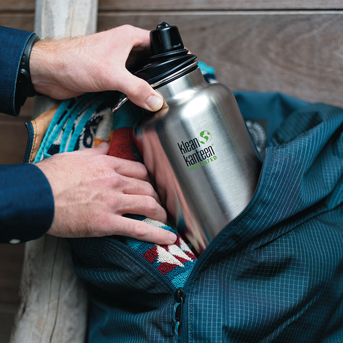 tkwide-chug-cap-o4 K64TKWSSL-BS-Chug-Cap-Out-of-Duffle_lifestyle.jpg