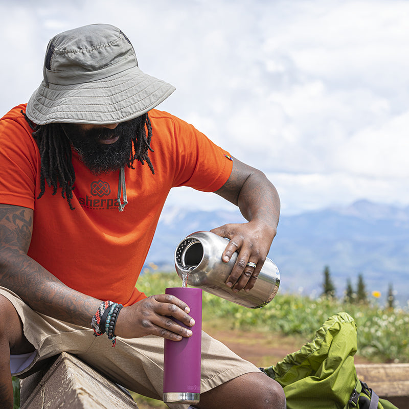 64oz-tkwide-with-loop-cap-h8 tkwide_64oz_bottle_backpacker_mountains_filling_square.jpg