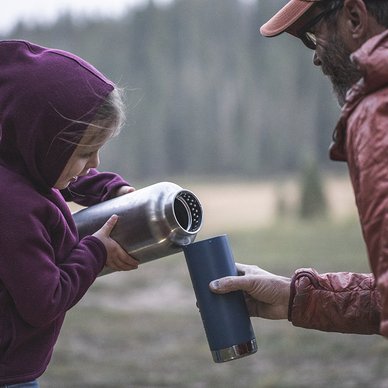 64oz-tkwide-with-loop-cap-h8 tkwide_64oz_bottle_girl_dad_filling_square.jpg